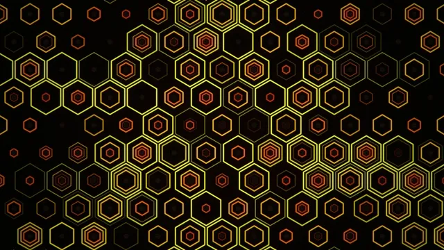 4K animated hexagon pattern loop with yellow and orange neon glow