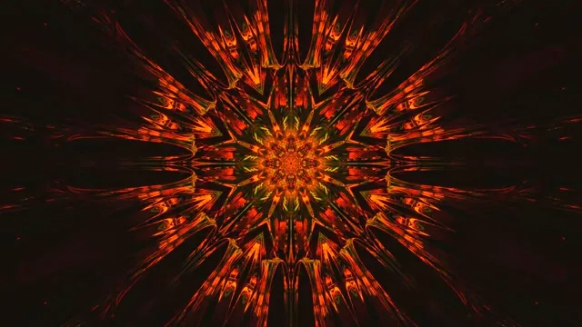 Tetemeko la mandala ya neon inayong'aa yenye miale ya machungwa na nyekundu katika VJ loop 4K