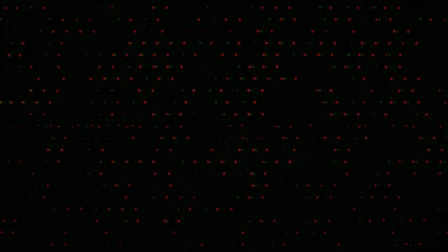 4K UHD animated particle field with red and green glowing dots