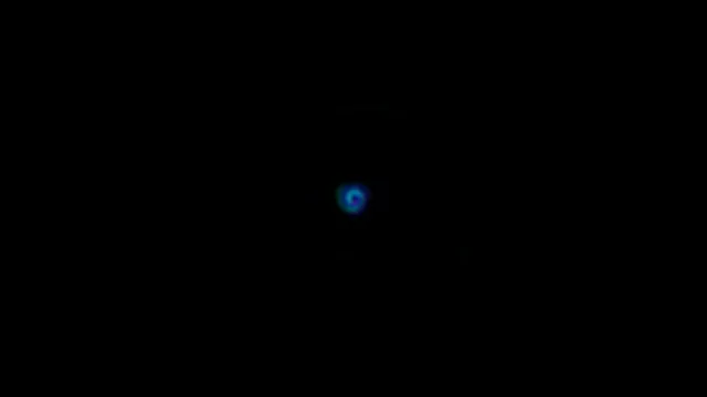 Blue Glowing Orb on Black Background 4K