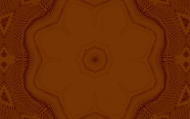 Simetriškas neono oranžinis mandalo gėlės šablonas su koncentriniais apskritimais, kuriančiais šiltą tunelio efektą VJ ciklams