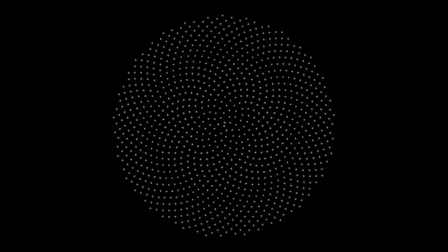 Circular pattern of dots creating a wave effect in black background