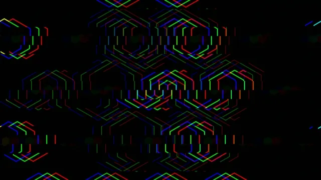 Colorful geometric patterns create a digital art scene at night