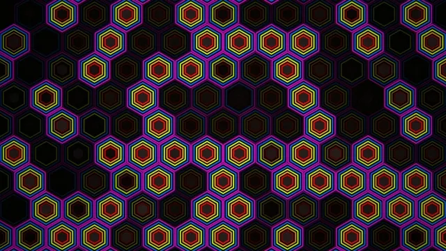 Colorful hexagons form a pattern on a dark background