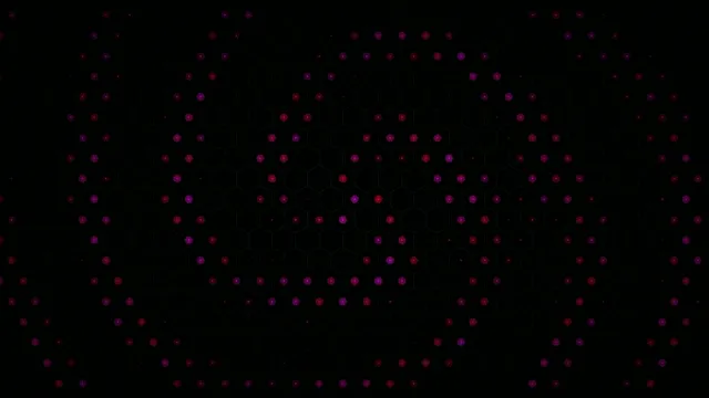 Colorful lights form a spiral pattern on a dark background