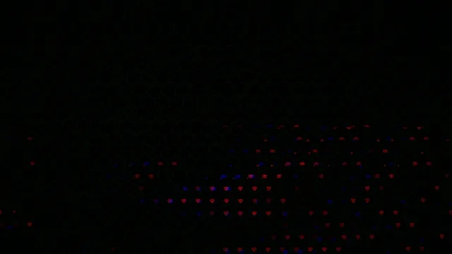 Colorful lights shine in dark space during a nighttime event