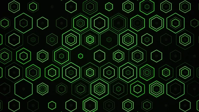Green hexagon pattern on a dark background shows geometric shapes