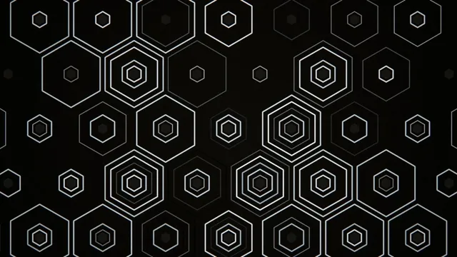 Hexagonal patterns on a dark background create visual interest