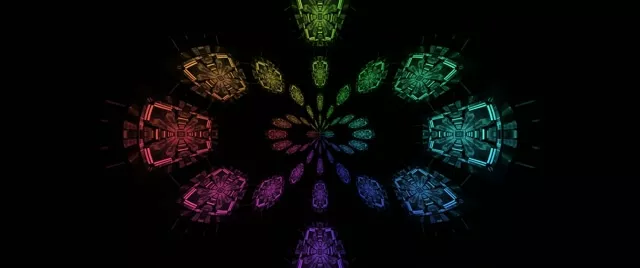 Mandala kaleidoskop neon bercahaya dengan bentuk-bentuk geometris bersinar yang memutar spiral dari pusat dalam nuansa hidup merah, ungu, biru, cyan dan emas, loop VJ 4K