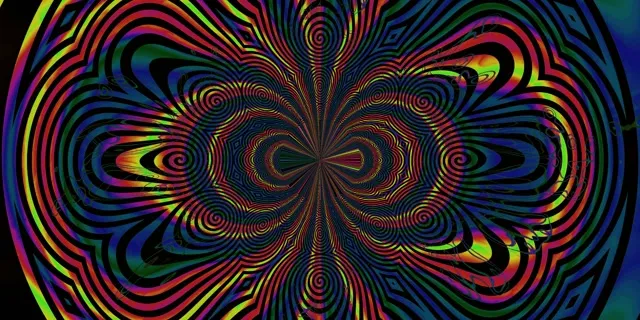 充满活力的迷幻螺旋涡旋，霓虹粉红色、黄色和蓝色同心环从中心辐射，为VJ循环创造无限隧道效果