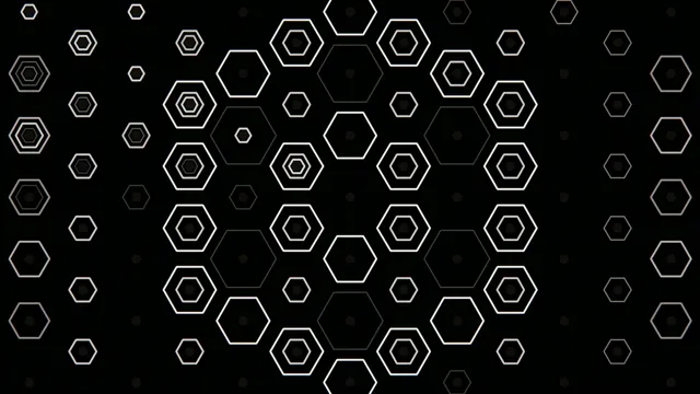 Patterns of hexagons on a black background create a striking design