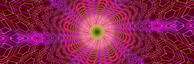 Gyvas neonas rožinis ir magneta fraktalus kaleidoskopinis tunelis su geometriniais šešiakampiais raštais, spinduliuojančiais iš geltonai-žalio centro – abstraktus 4K VJ ciklas