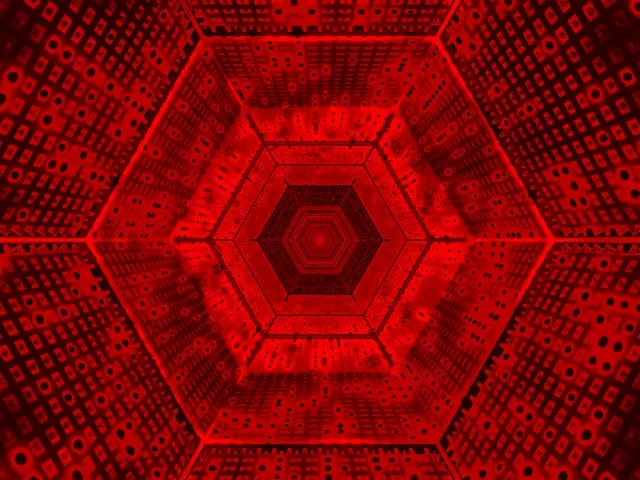 تونل نئون شش ضلعی قرمز عمیق با لایه های هندسی متحدالمرکز که به سمت تاریکی عقب نشینی می کنند، اثر گردباد سه بعدی ایجاد می کنند. حلقه VJ انتزاعی.