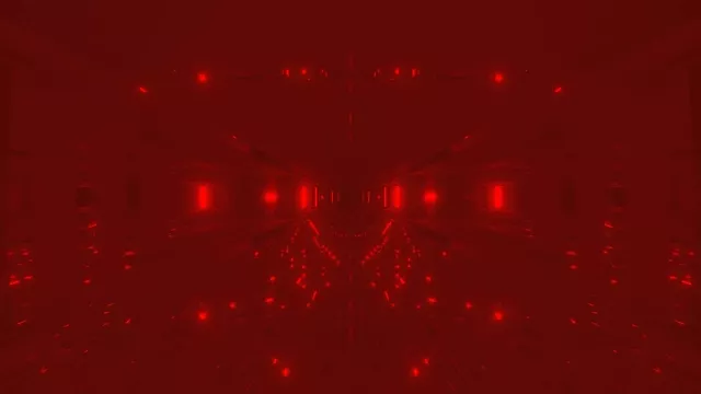 Hầm neon sâu đỏ với ánh sáng rực rỡ biến mất trong bóng tối, nền chuyển động vòng lặp VJ trừu tượng
