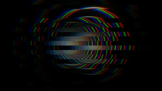 Swirling colors form dynamic patterns in a dark space