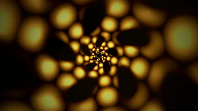 Swirling pattern of golden shapes in dark space